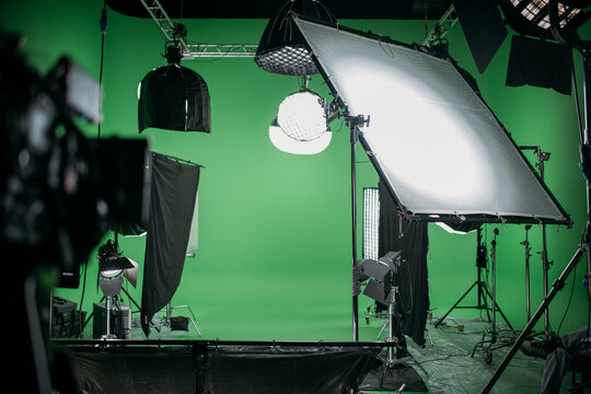 Film set, monitors and modern shooting equipment. Film crew, lighting devices, monitors, playbacks - filming equipment and a team of specialists in filming movies, advertising and TV series