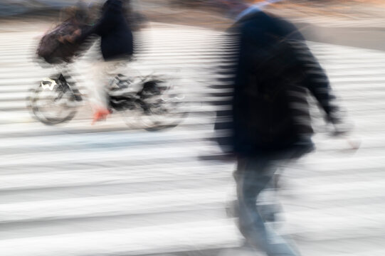 Motion Blurred Cyclists and Pedestrians on Zebra Crossing