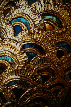 Wall art features traditional patterns in a cultural setting