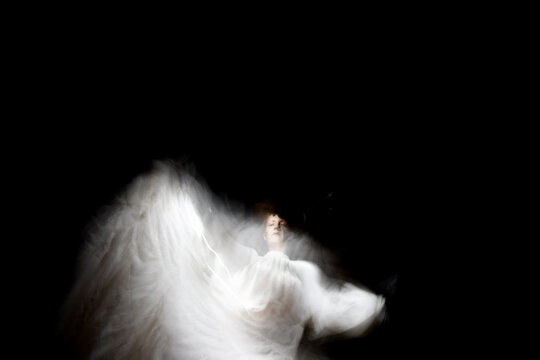 Dance in white in the dark 
