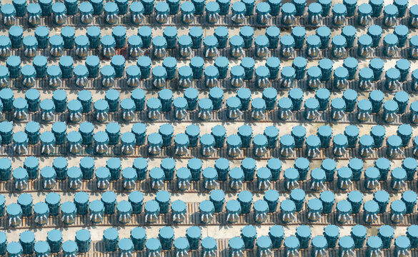 Rows of Industrial Electrical Transformers in Factory