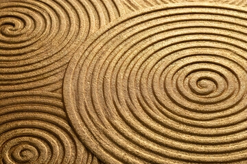 Fototapeta premium Abstract golden background with concentric circles, spiral pattern, textured surface, metallic finish, luxury design, closeup view of circular ripples in gold material