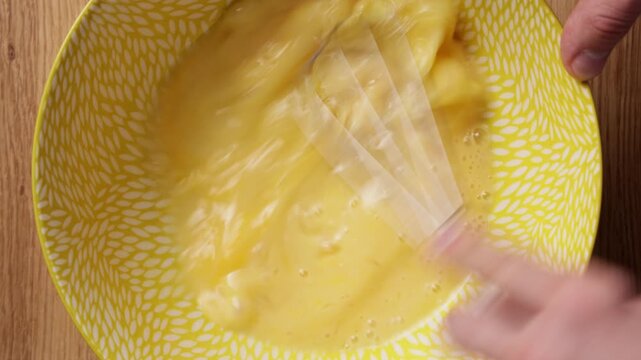 Whisking Eggs In Bowl Close Up Top View