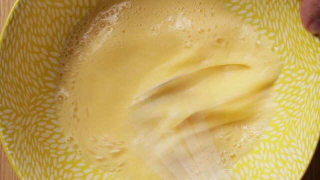 Whisking Eggs In Bowl Extreme Close Up Top View
