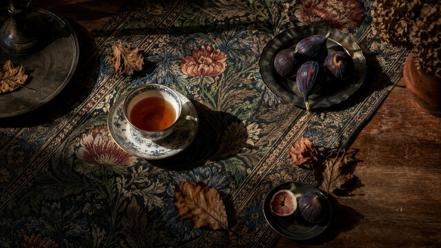 Late Summer Tea Time Still Life with Classical Floral Textile, Figs and Dramatic Window Light