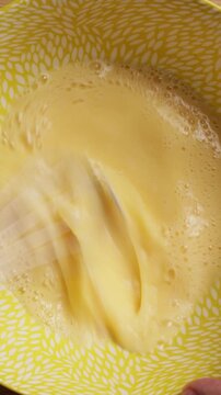 Whisking Eggs In Bowl Extreme Close Up Top View Vertical