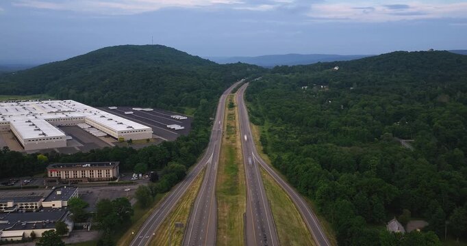 Fishkill NY - June 10, 2026:  Hyperlapse, time lapse, aerial video of Interstate 84 heading east in Dutchess County, New York on an overcast spring afternoon spring.
