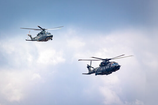 Italian Air Force AW139 helicopters in flight.