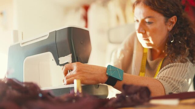 Crafting with a sewing machine in a workshop during the day