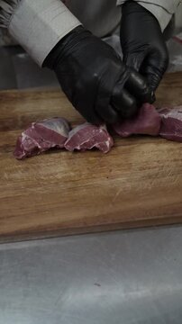 cutting the beef at the shank