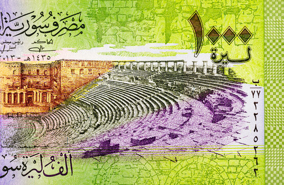 1000 Pounds of Syria with the image of The Bosra Amphitheater, an ancient Roman theater in Bosra. Money of Syria.