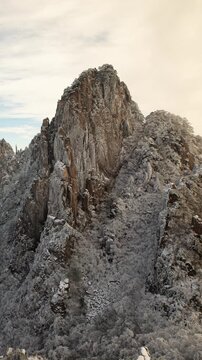 Time lapse looking out over a sea of fog at the Yellow Mountains (Huangshan) in China. Vertical video.