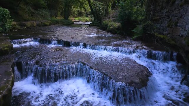 Landscape along a river near San Pedro del Romeral. Pas-Miera region. Pasiegos Valleys. Cantabria. Spain. Europe