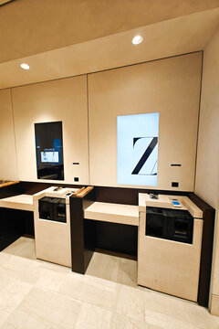Valencia, Spain - June 17, 2026: Zara store self checkout RFID system and automated online order pickup wall. Zara is globally popular brand offering modern and trendy clothing