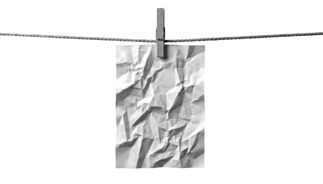 Halftone Style Crumpled Blank White Paper Hanging on a Clothesline with Peg