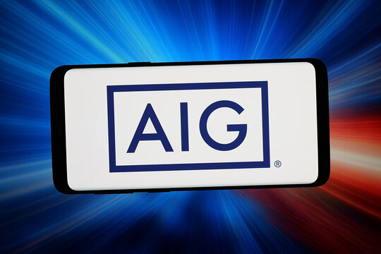 Stuttgart, Germany - 06-12-2026: In this photo illustration, the logo of US company American International Group (AIG) is displayed on a smartphone in front of abstract background on computer screen.