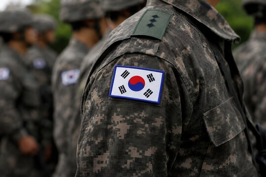 South Korean soldier in military. For national defense, patriotism, military readiness, geopolitical tension, alliance and security in East Asia, duty, honor, and state sovereignty