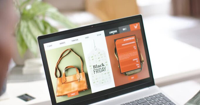User shifting is bringing hands, pointing at laptop with Black Friday handbag while deciding to buy