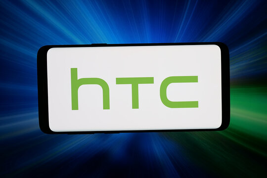 Stuttgart, Germany - 06-15-2026: In this photo illustration, the logo of Taiwanese electronics company HTC Corporation is displayed on a smartphone in front of abstract background on computer screen.