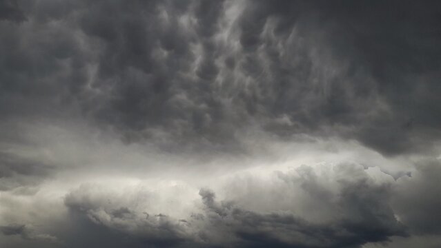 Ominous mammatocumulus storm clouds overcasting the sky.