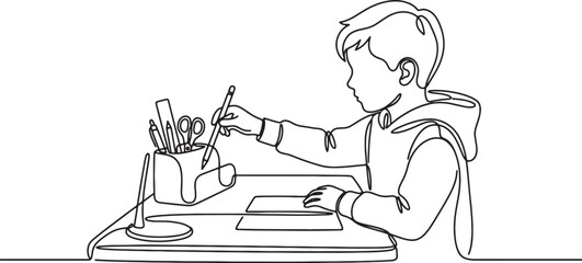 Obraz premium Child Drawing at Desk in a Creative Environment