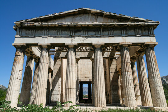 Front view of classical Doric columns at the Temple of Hephaestus Athens