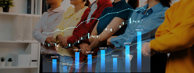 A diverse group of business professionals stands together, united by a shared goal, with finance charts and graphs showcasing growth and teamwork in a modern office environment. Scalp © InfiniteFlow