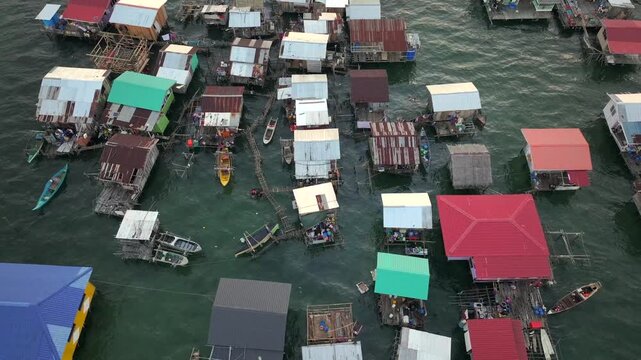 Aerial View on traditional stilt houses of Sama-Bajau people in Semporna. Sea Gypsies of Island Borneo, Sabah, Malaysia.