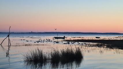 Arcachon et le sud du Bassin vus depuis les prés salés de Claouey au coucher du soleil (presqu'île du Cap Ferret) © Arnaud