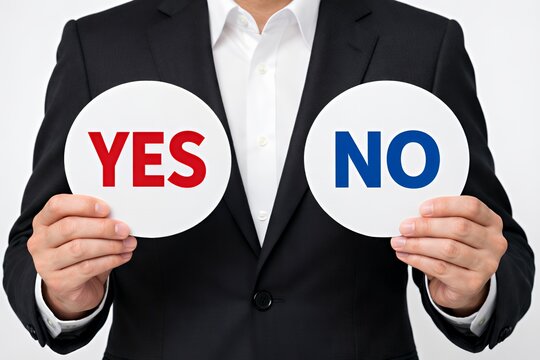 YESとNOの選択を示す手元が二択の決断を促すビジネス表現