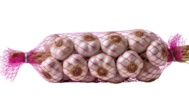 Isolated fresh whole garlic bulbs in a vibrant pink mesh packaging net, healthy food ingredient