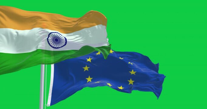 Flags of India and the European Union waving isolated on green background