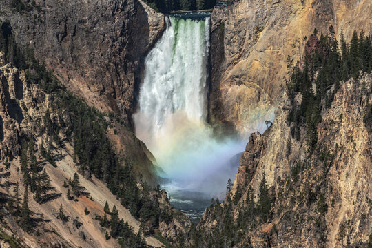 Lower Falls with Rainbow Cascading Through Grand Canyon of Yellowstone National Park