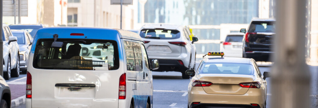 Heavy urban traffic congestion during weekday rush hours, with long queues of vehicles, illustrating commuting delays, city infrastructure pressure, and daily transportation challenges.