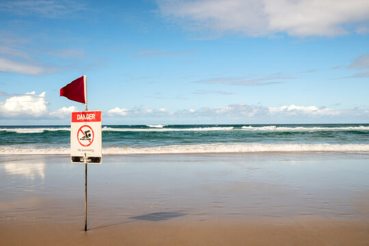 Danger No Swimming Sign at Surfers Paradise Beach in Gold Coast, Australia