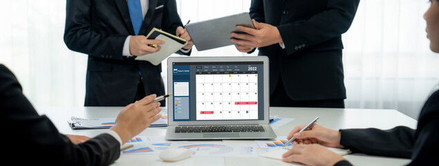 Fototapeta premium Calendar on computer software application for brisk schedule planning for personal organizer and online business