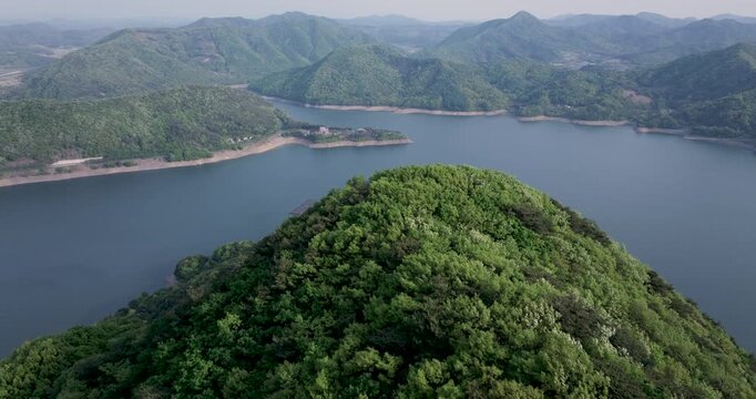 Aerial view of Boryeongho Lake and green mountains, South Korea