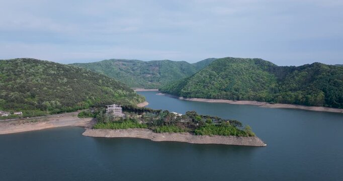 Aerial view of Boryeongho Lake and green mountains, South Korea