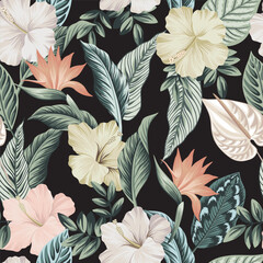 Tropical Hawaiian hibiscus flower, palm leaves floral seamless pattern black background. Exotic jungle wallpaper. © good_mood