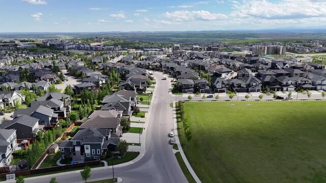 Aerial view of a quiet suburban street and houses in Calgary, Canada. 