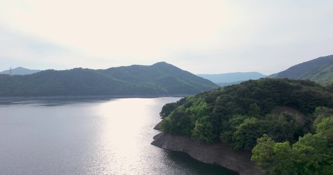Aerial view of Boryeongho Lake and green mountains, South Korea