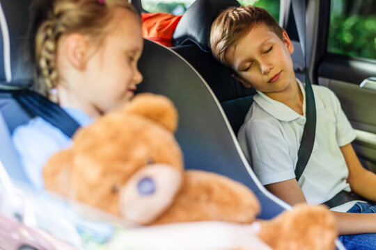 Children sleeping during car ride