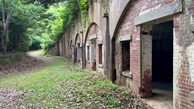 Himegamiyama Battery Ruins featuring historic red brick military barracks on Tsushima Island, Nagasaki Prefecture, Japan.