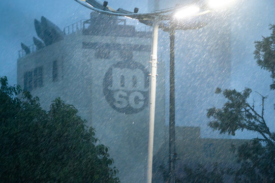 Navegantes-Sc,brasil-June 19,2026,MSC ship passing in front of a window on a very rainy night