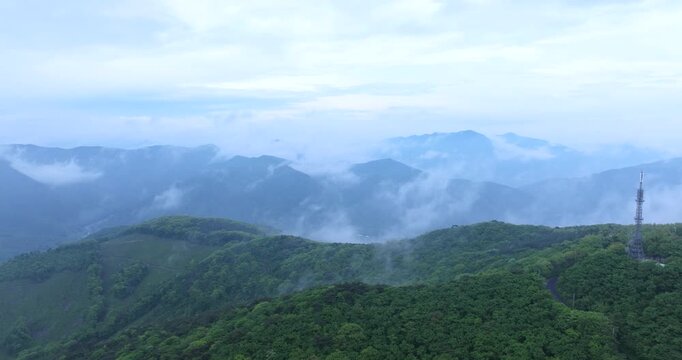 seongjusan, boryeong, south korea, aerial view, drone shot, hyperlapse, timelapse, mountain fog, mist, misty morning, cloudy sky, fast motion, atmospheric, majestic nature, serene landscape, pine tree