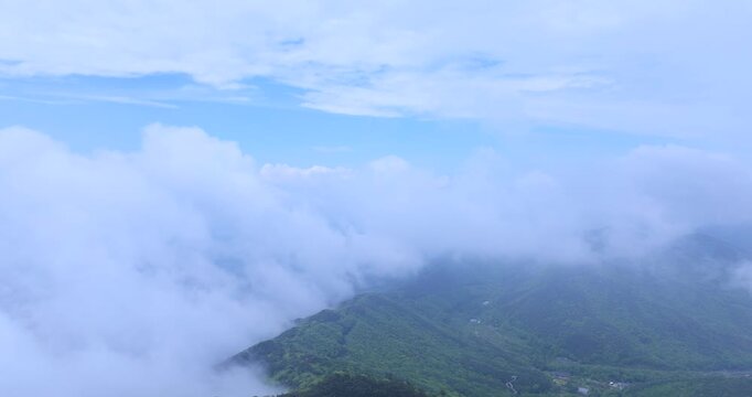 seongjusan, boryeong, south korea, aerial view, drone shot, hyperlapse, timelapse, mountain fog, mist, misty morning, cloudy sky, fast motion, atmospheric, majestic nature, serene landscape, pine tree