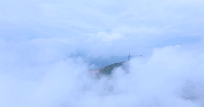 seongjusan, boryeong, south korea, aerial view, drone shot, hyperlapse, timelapse, mountain fog, mist, misty morning, cloudy sky, fast motion, atmospheric, majestic nature, serene landscape, pine tree