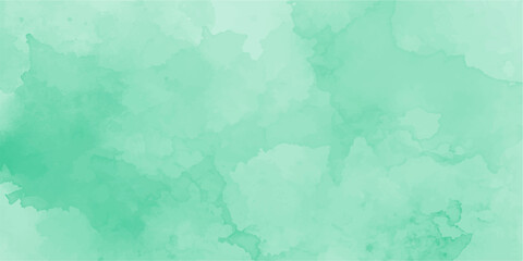 Fototapeta premium Abstract watercolor wash in serene mint green tones, creating a soft and artistic background with organic textures and subtle gradients.
