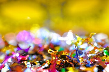 mardi gras carnival mask between colorful confetti  © Adriana