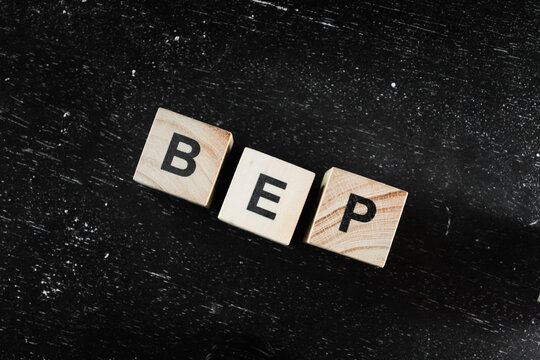 Wooden Block words on black background.